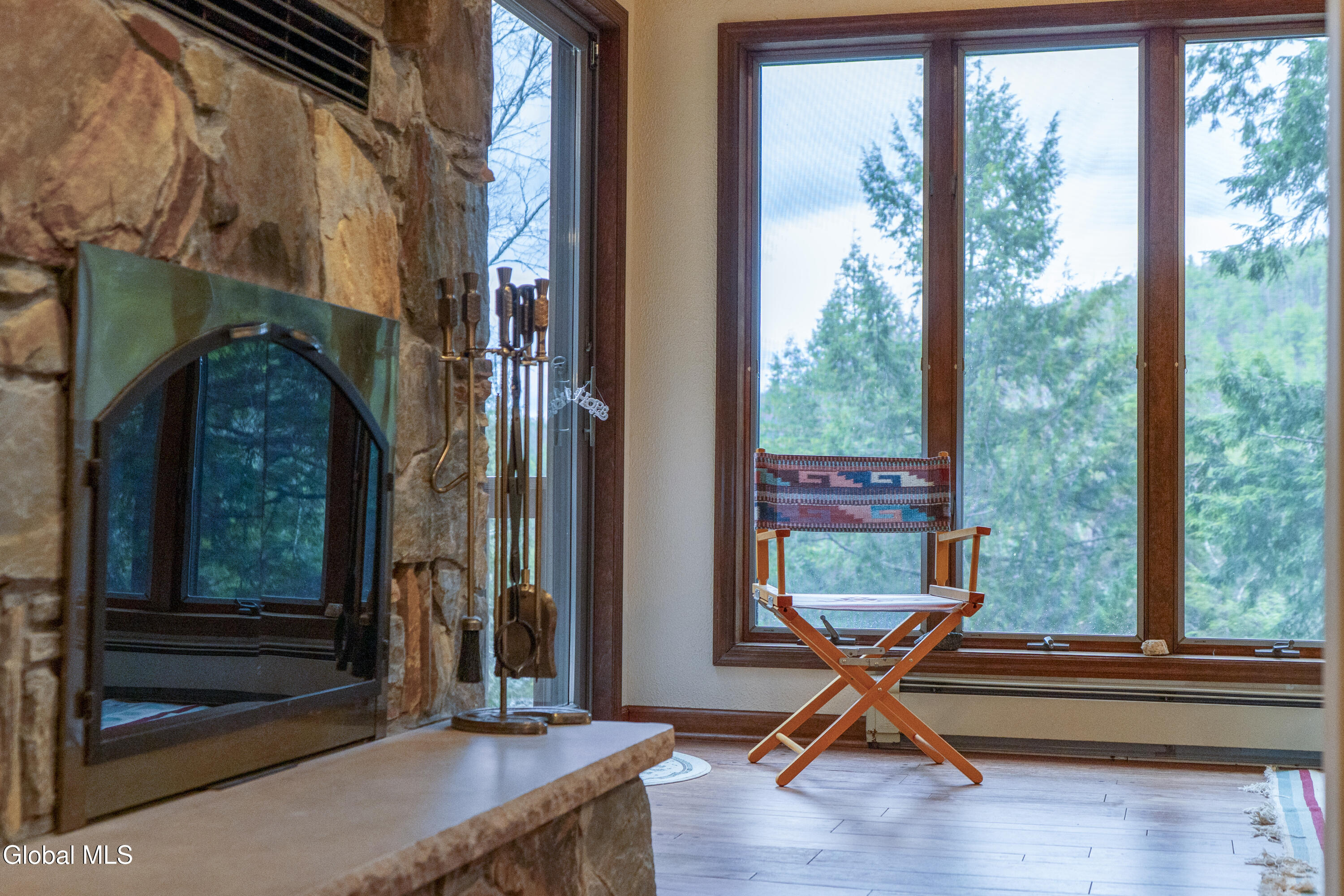 441 East Kelm Pond Road Warrensburg, NY 12817 - Photo 10 of 26 Stone F/P leading to deck