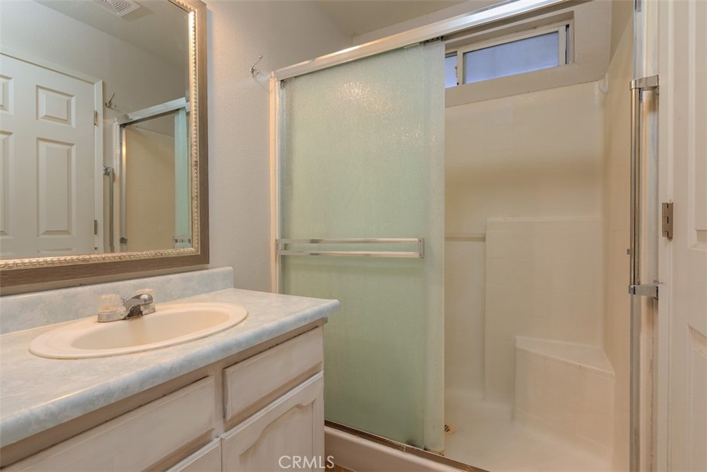 2732 Lowell Drive Chico, CA 95973 - Photo 21 of 40 a bathroom with a sink and a mirror