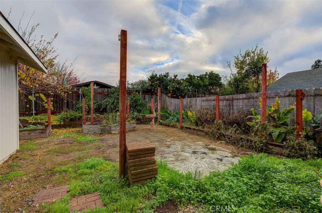 2732 Lowell Drive Chico, CA 95973 - Photo 30 of 40 a backyard of a house with lots of green space