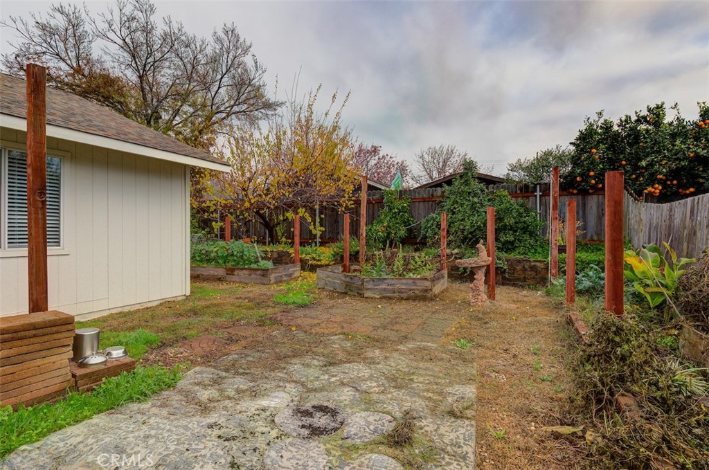 2732 Lowell Drive Chico, CA 95973 - Photo 31 of 40 a view of a yard with plants and a bench