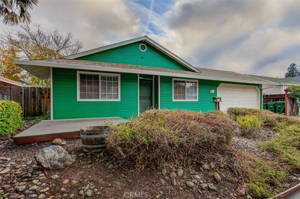 2732 Lowell Drive Chico, CA 95973 - Photo 38 of 40 a front view of house with yard and outdoor seating
