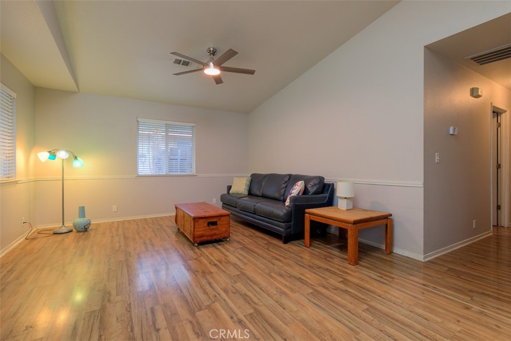 2732 Lowell Drive Chico, CA 95973 - Photo 5 of 40 a living room with furniture and a wooden floor