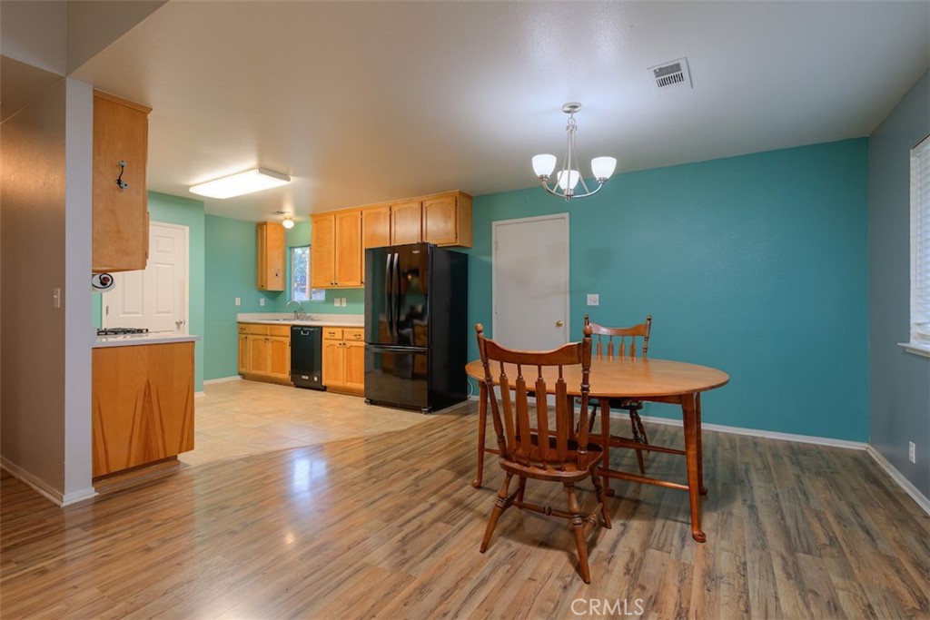 2732 Lowell Drive Chico, CA 95973 - Photo 8 of 40 a dining room with furniture and wooden floor