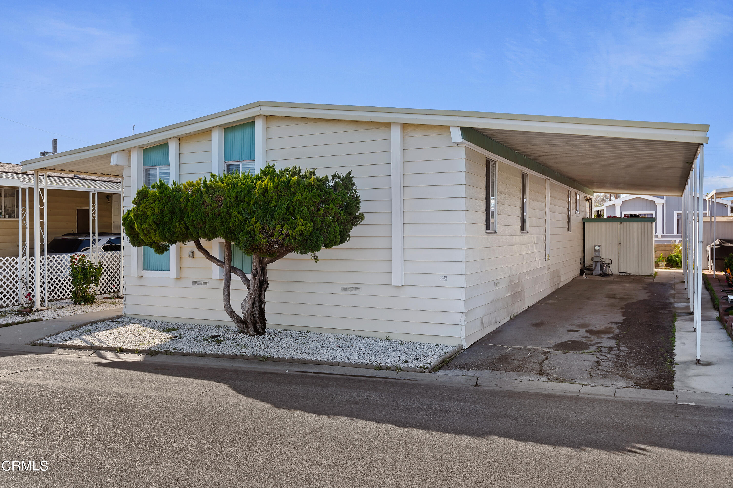 105 Fontana Drive, Unit 3 Oxnard, CA 93033 - Photo 2 of 20 a front view of a house with plants