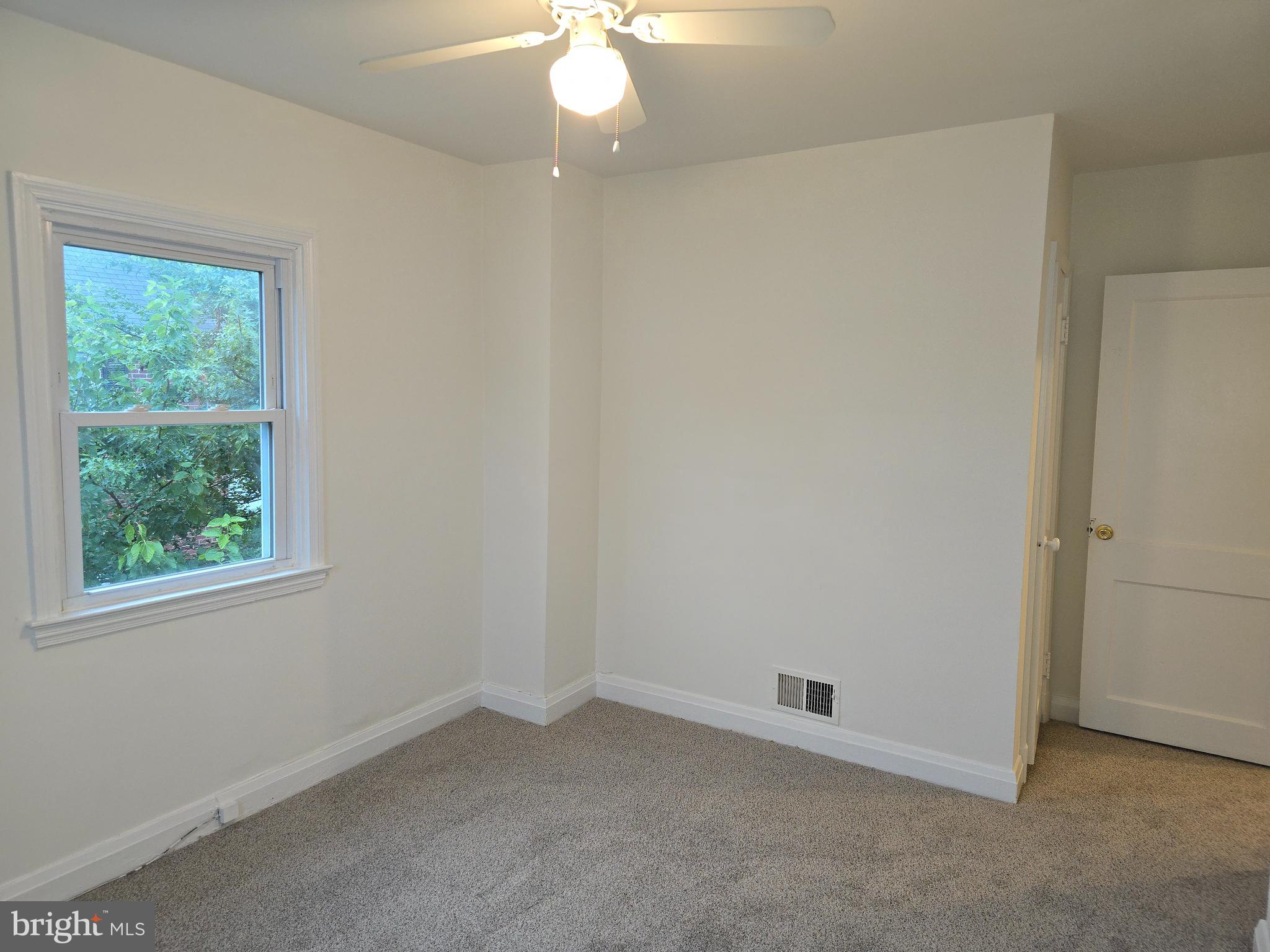 8625 Black Oak Road Baltimore, MD 21234 - Photo 13 of 36 an empty room with a window