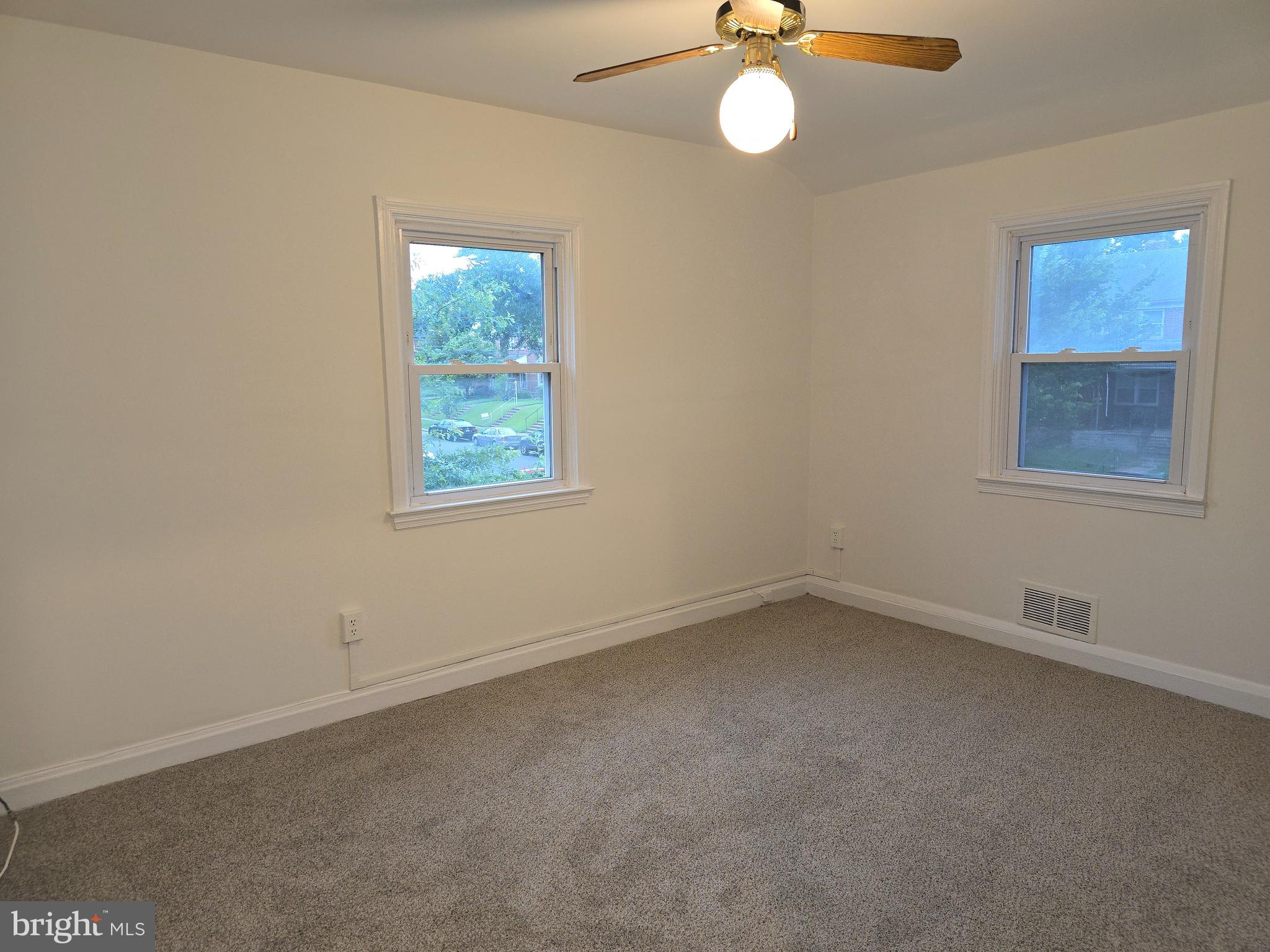 8625 Black Oak Road Baltimore, MD 21234 - Photo 14 of 36 an empty room with a window