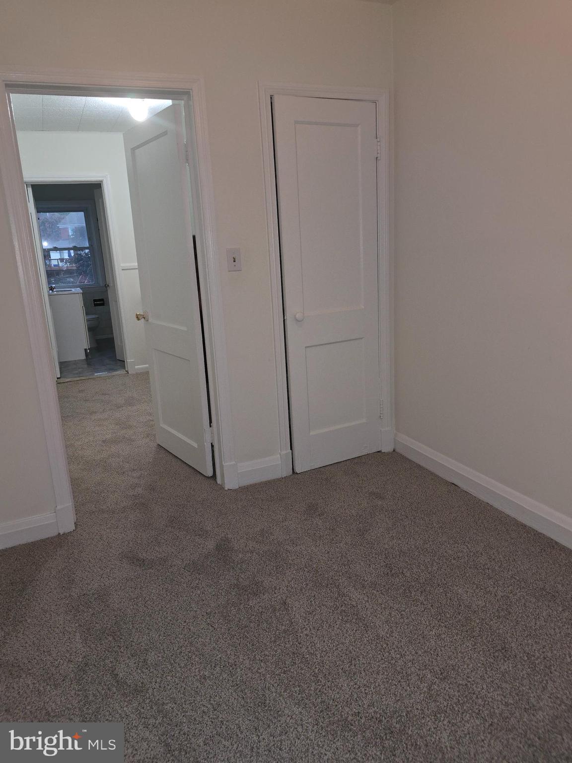 8625 Black Oak Road Baltimore, MD 21234 - Photo 17 of 36 an empty room with an entrance to other room