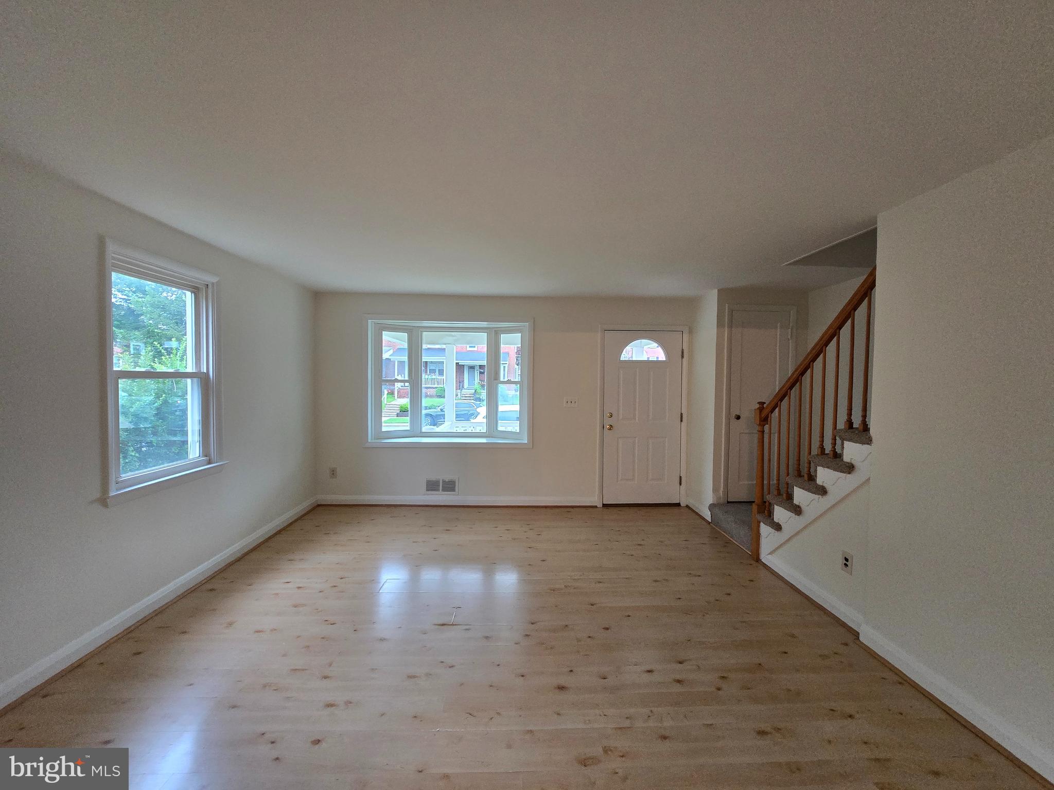 8625 Black Oak Road Baltimore, MD 21234 - Photo 2 of 36 an empty room with windows