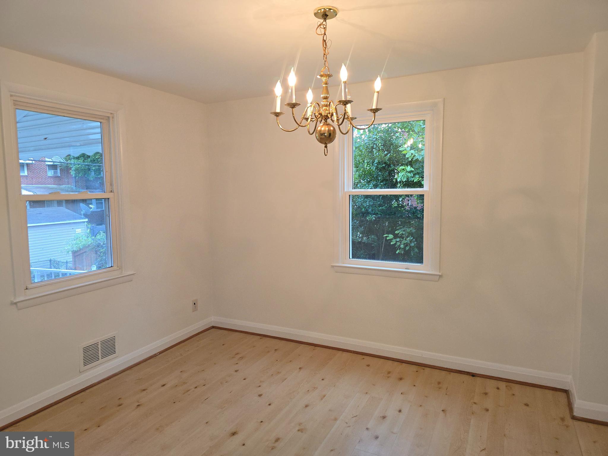8625 Black Oak Road Baltimore, MD 21234 - Photo 28 of 36 a view of a chandelier in a room