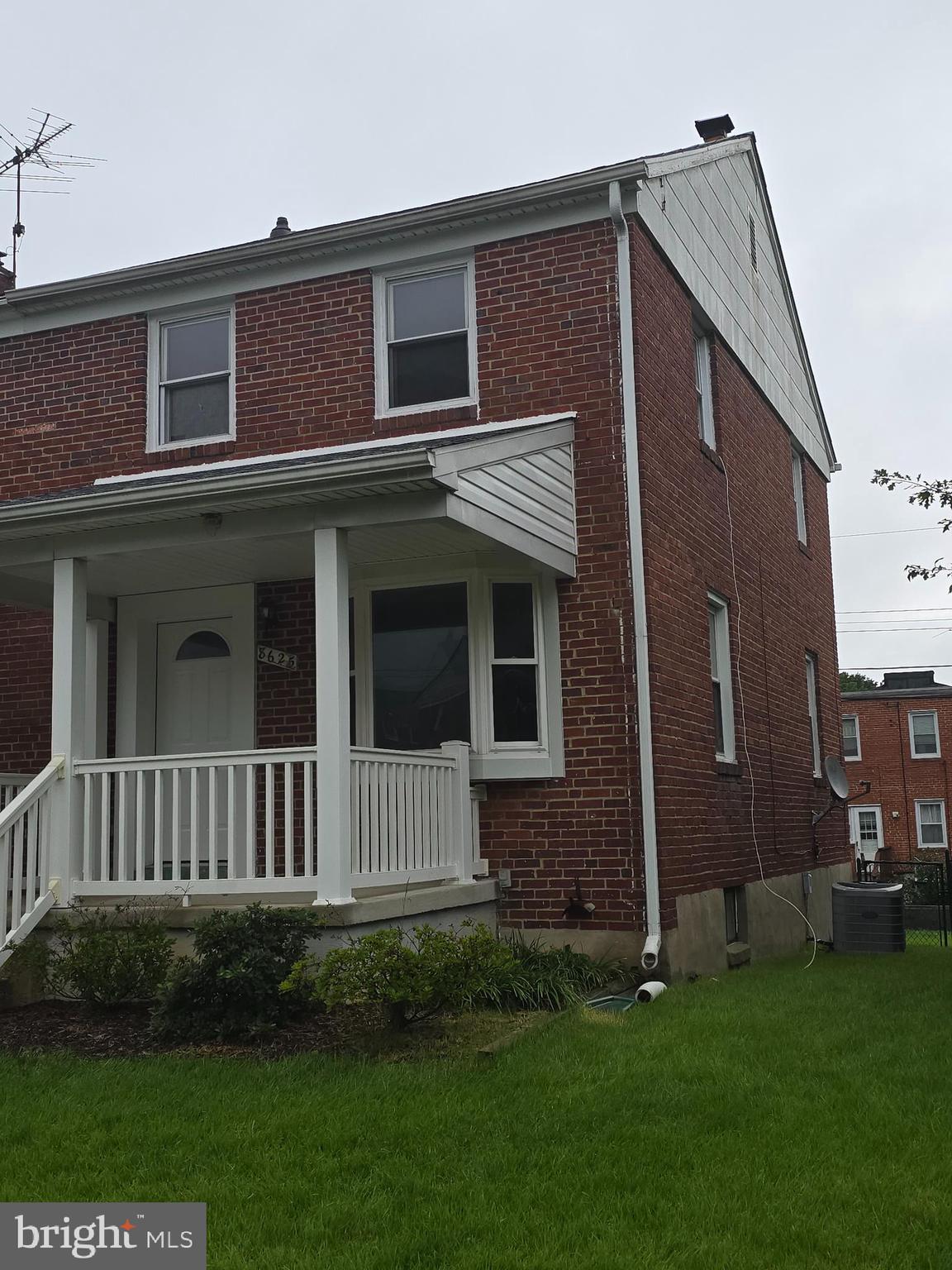 8625 Black Oak Road Baltimore, MD 21234 - Photo 33 of 36 a front view of a house with garden