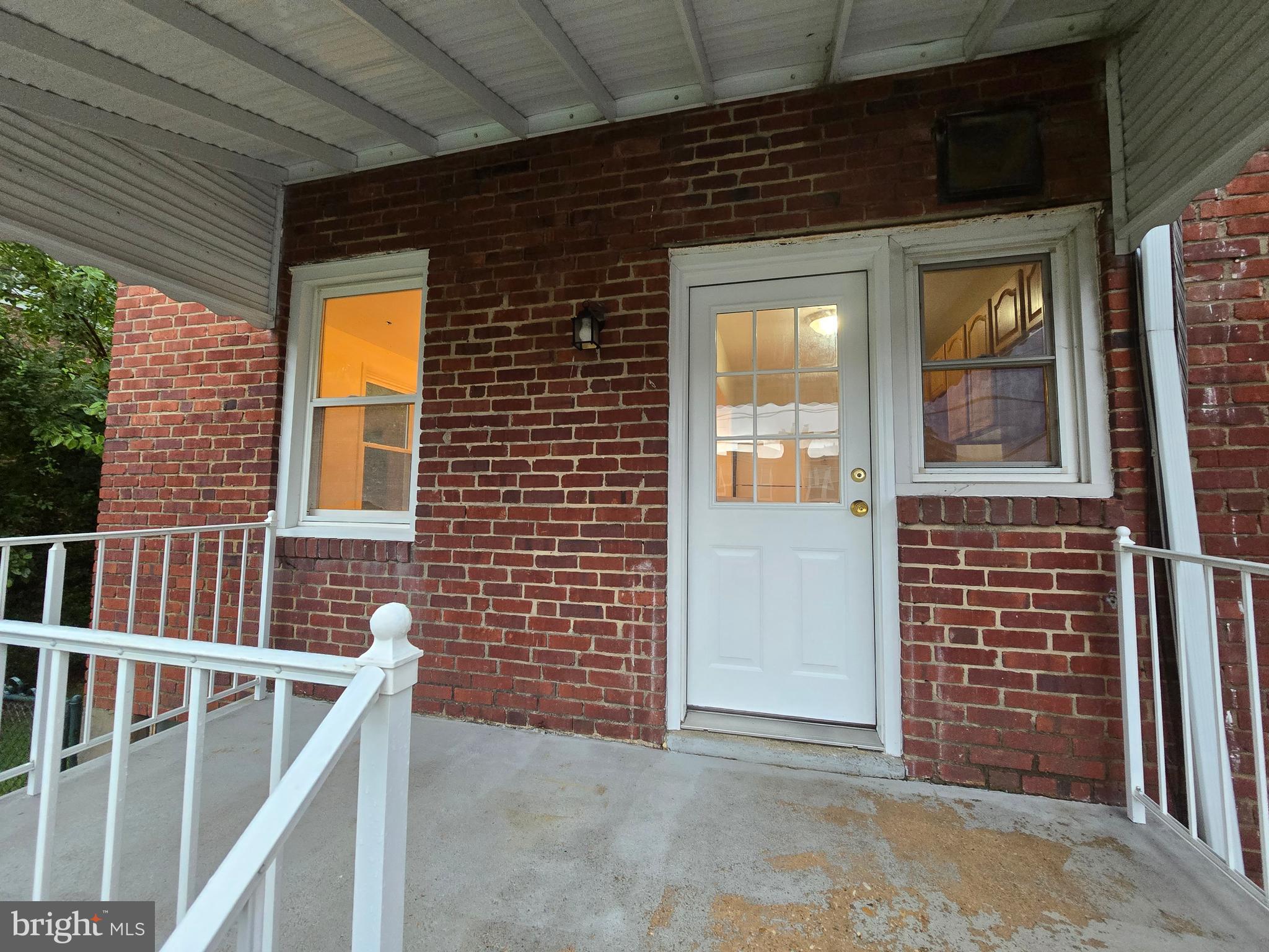 8625 Black Oak Road Baltimore, MD 21234 - Photo 34 of 36 a view of front door of house with stairs
