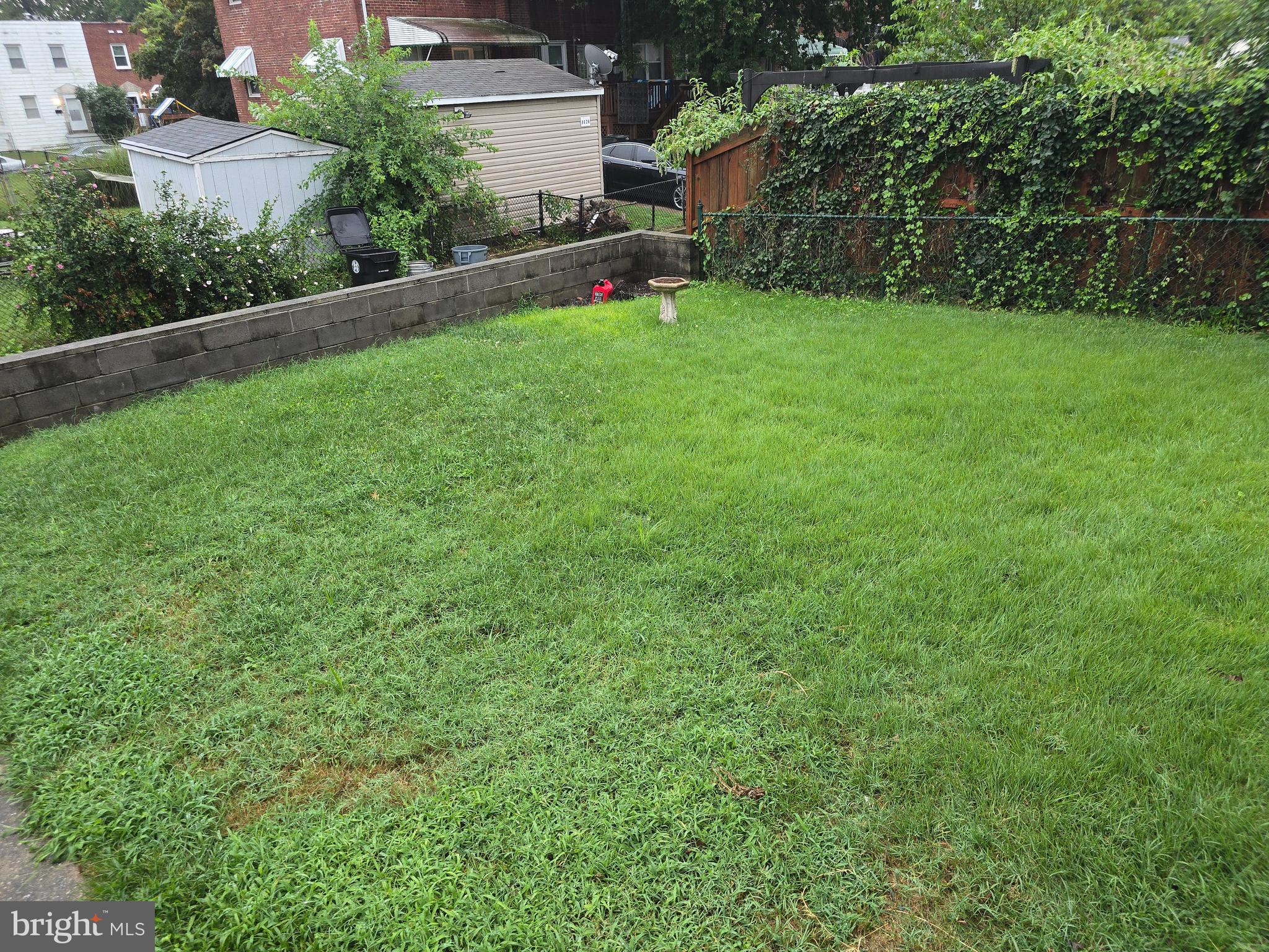 8625 Black Oak Road Baltimore, MD 21234 - Photo 35 of 36 a green field with lots of bushes