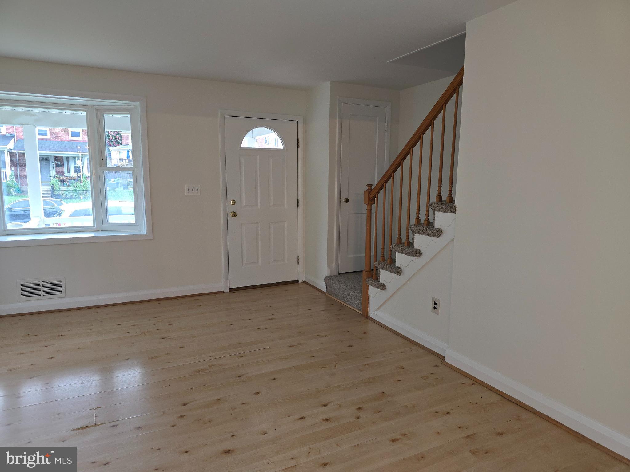 8625 Black Oak Road Baltimore, MD 21234 - Photo 4 of 36 a view of an entryway with wooden floor