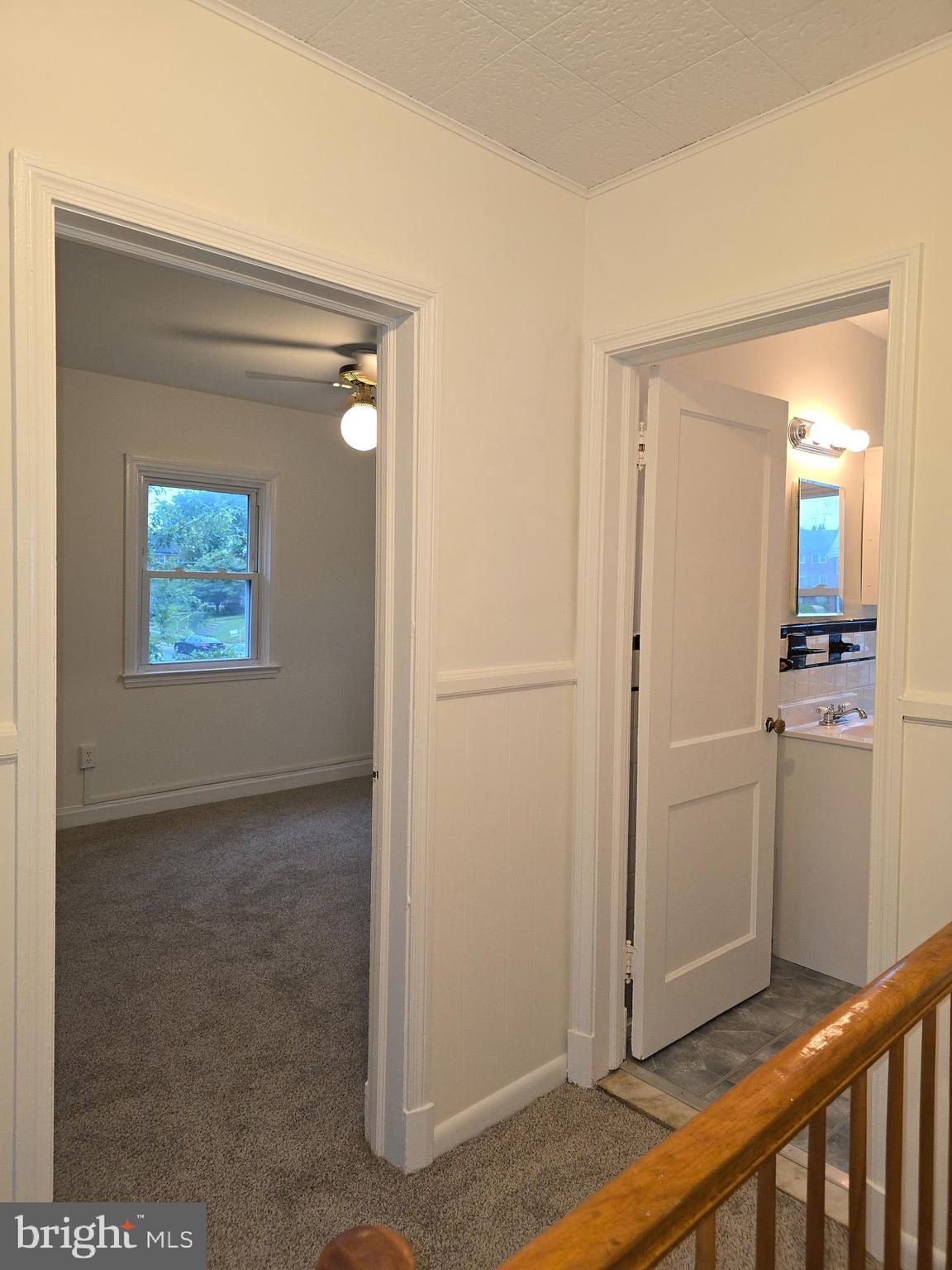 8625 Black Oak Road Baltimore, MD 21234 - Photo 9 of 36 a view of a hallway with a dining room