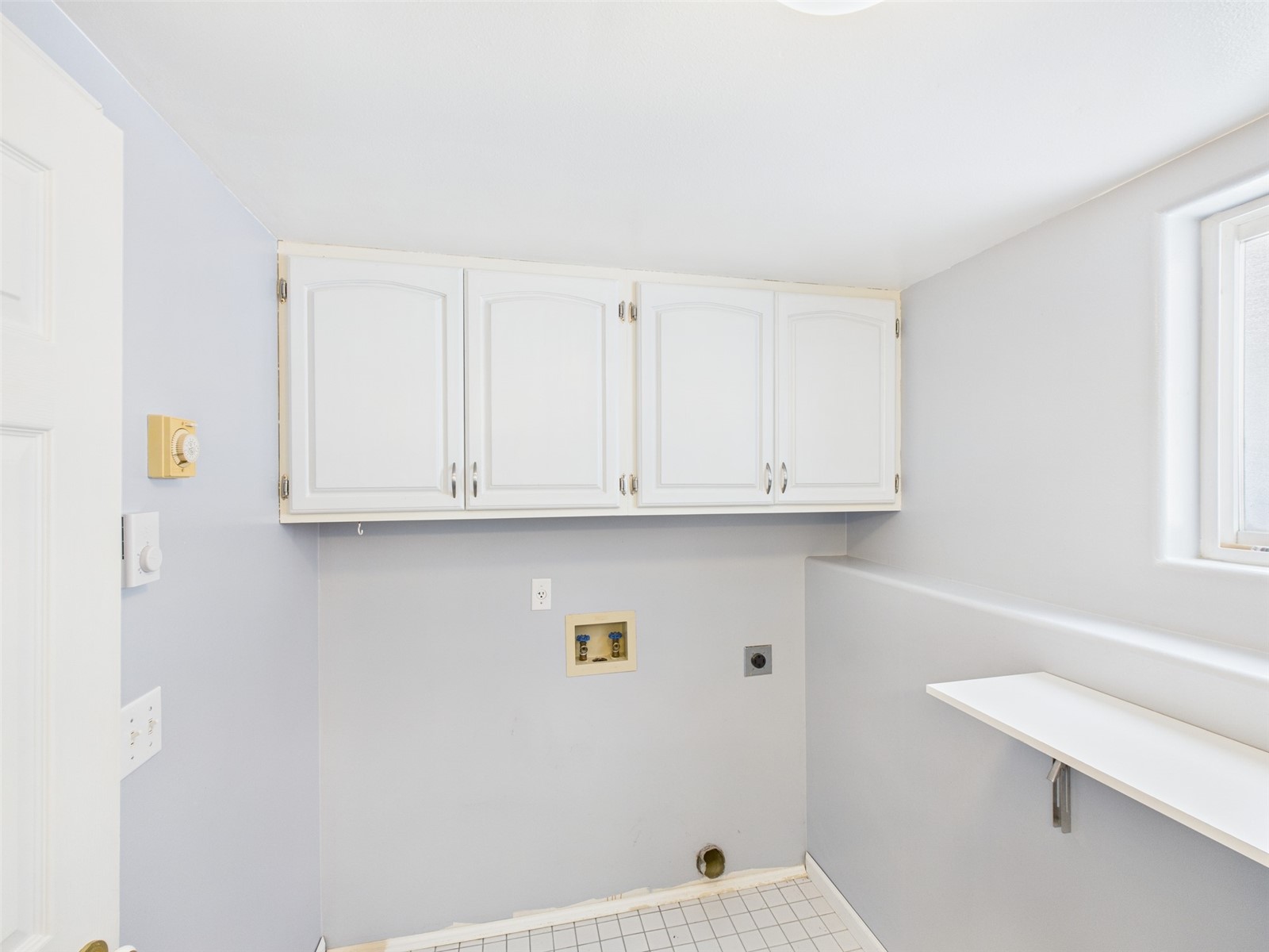 1023 North Adams Street Republic, WA 99166 - Photo 16 of 33 a view of kitchen with white cabinets