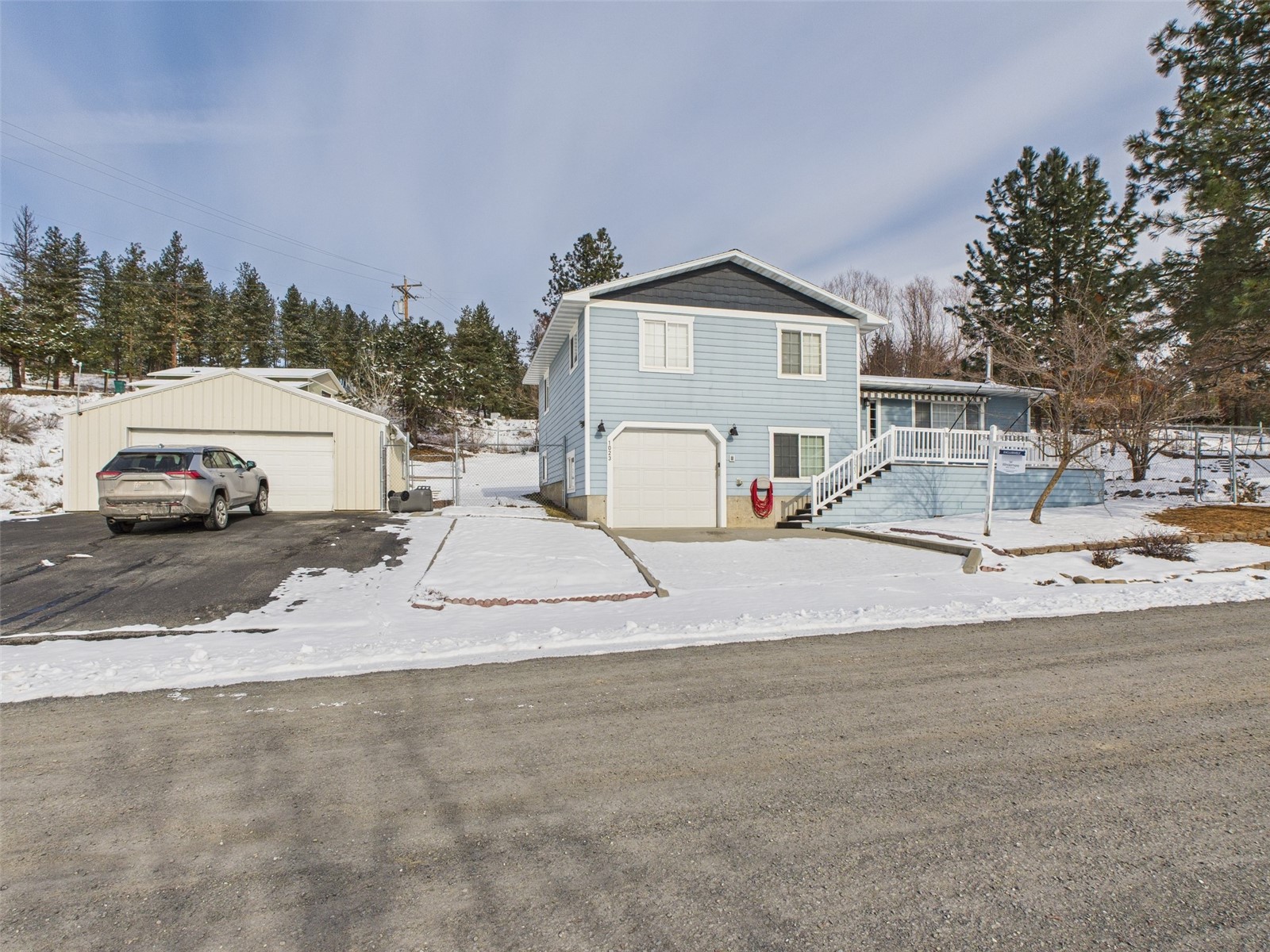 1023 North Adams Street Republic, WA 99166 - Photo 19 of 33 a view of a house with a yard and car parked