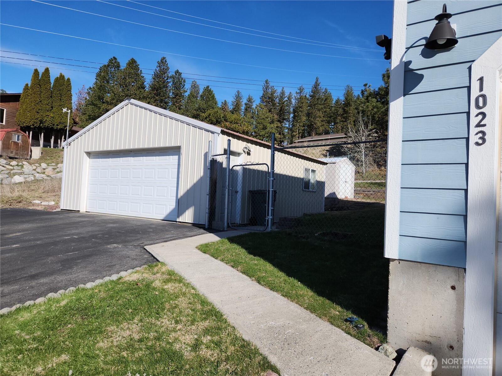 1023 North Adams Street Republic, WA 99166 - Photo 20 of 33 a view of a house with a yard