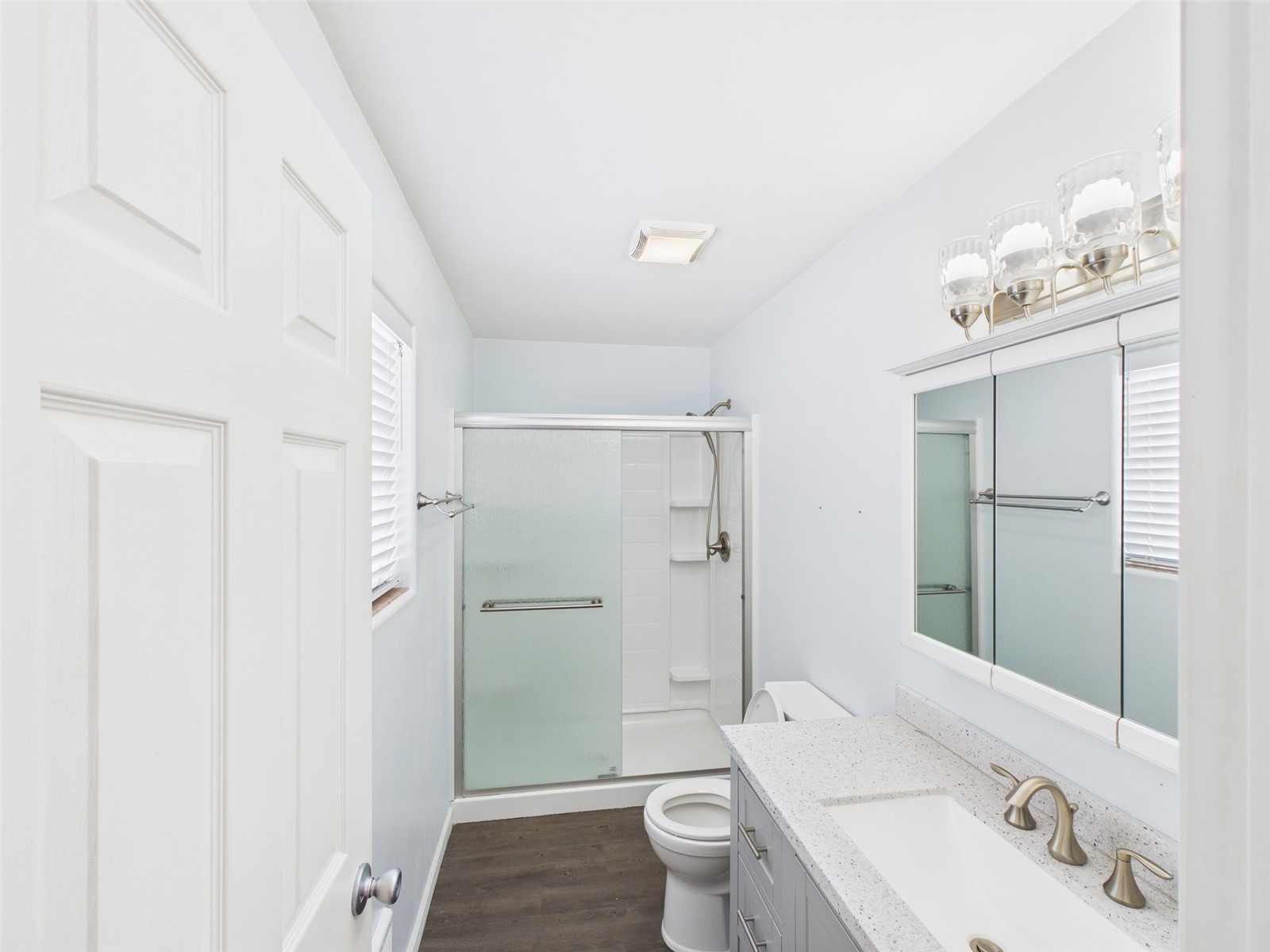 1023 North Adams Street Republic, WA 99166 - Photo 8 of 33 a bathroom with a sink a toilet and shower