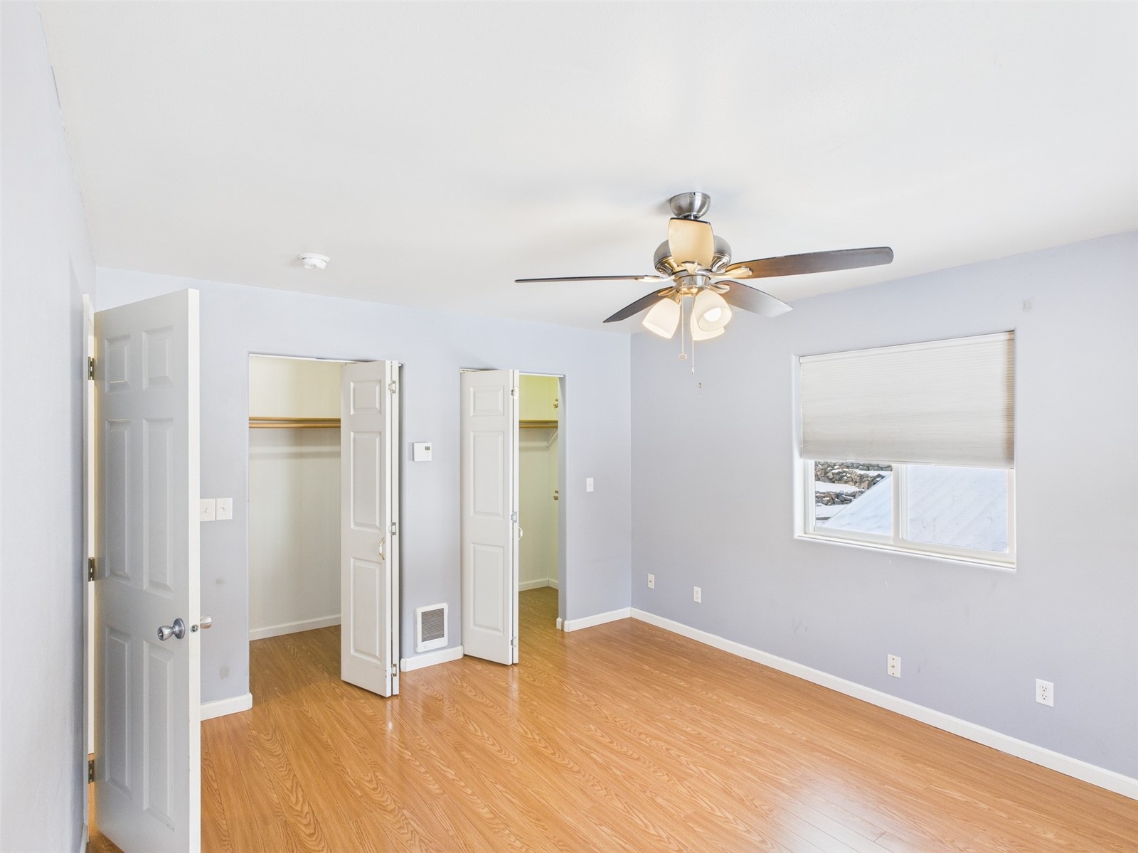 1023 North Adams Street Republic, WA 99166 - Photo 9 of 33 a view of a livingroom with a chandelier fan and a window