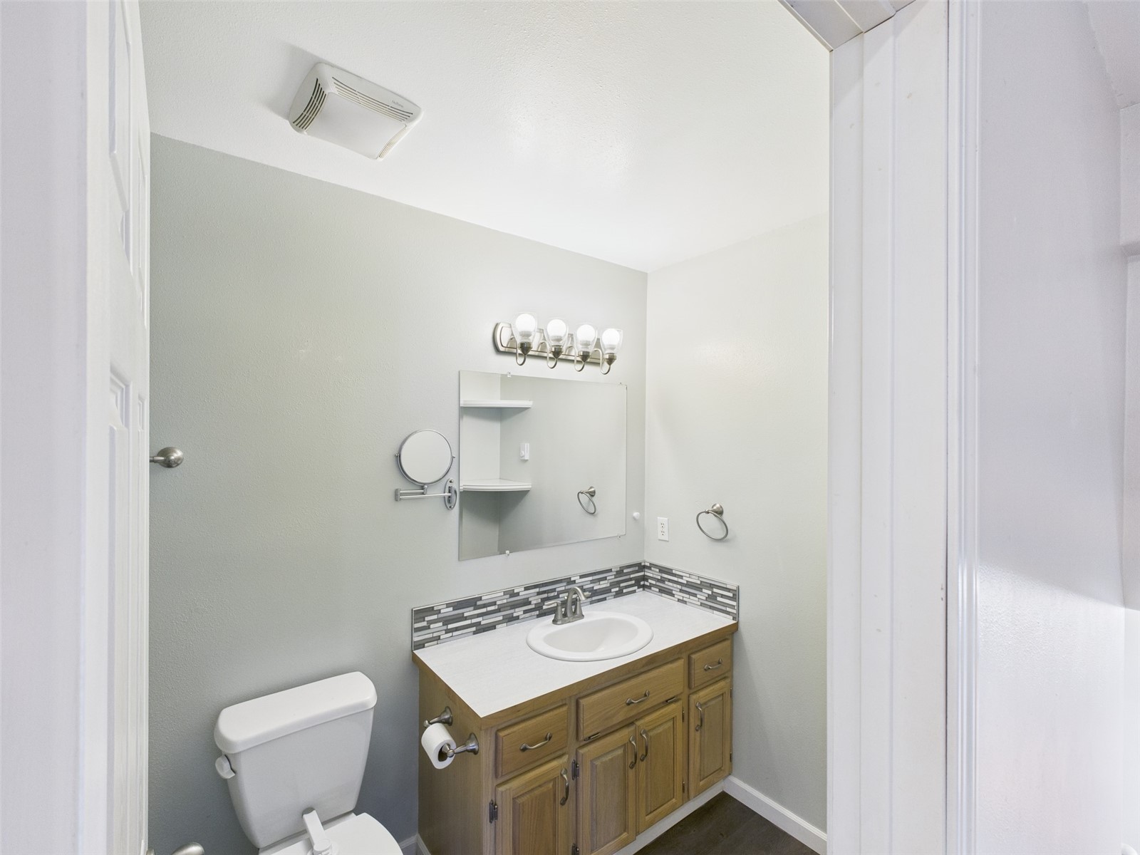 1023 North Adams Street Republic, WA 99166 - Photo 10 of 33 a bathroom with a sink a toilet and a mirror