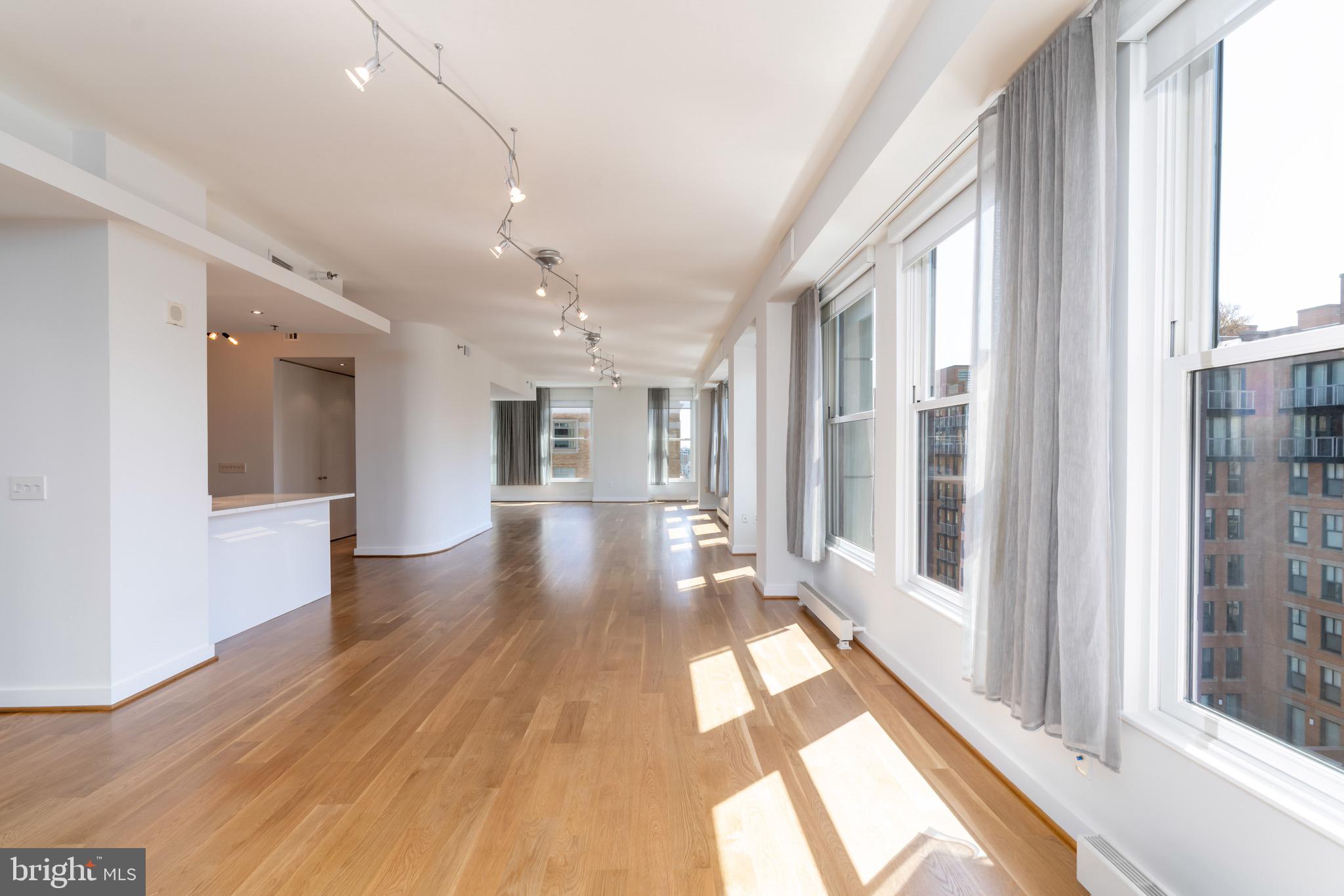 675 E Street Northwest, Unit 900 Washington, DC 20004 - Photo 14 of 46 Expansive living space, nearly 60' expanse
