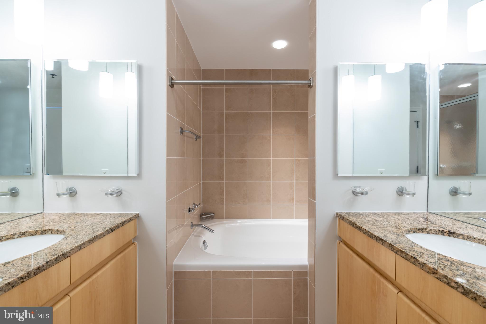 675 E Street Northwest, Unit 900 Washington, DC 20004 - Photo 31 of 46 Master bathroom