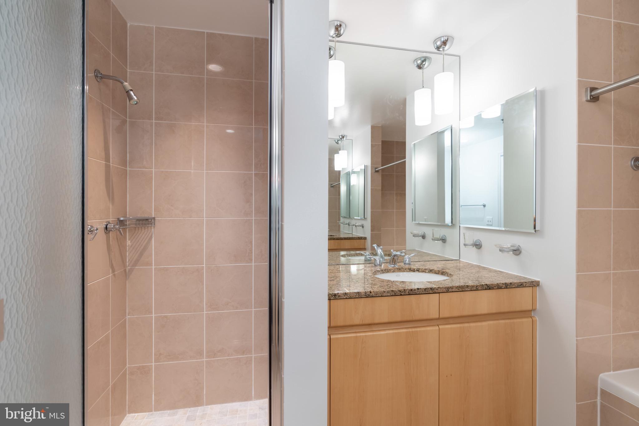 675 E Street Northwest, Unit 900 Washington, DC 20004 - Photo 32 of 46 Master bathroom