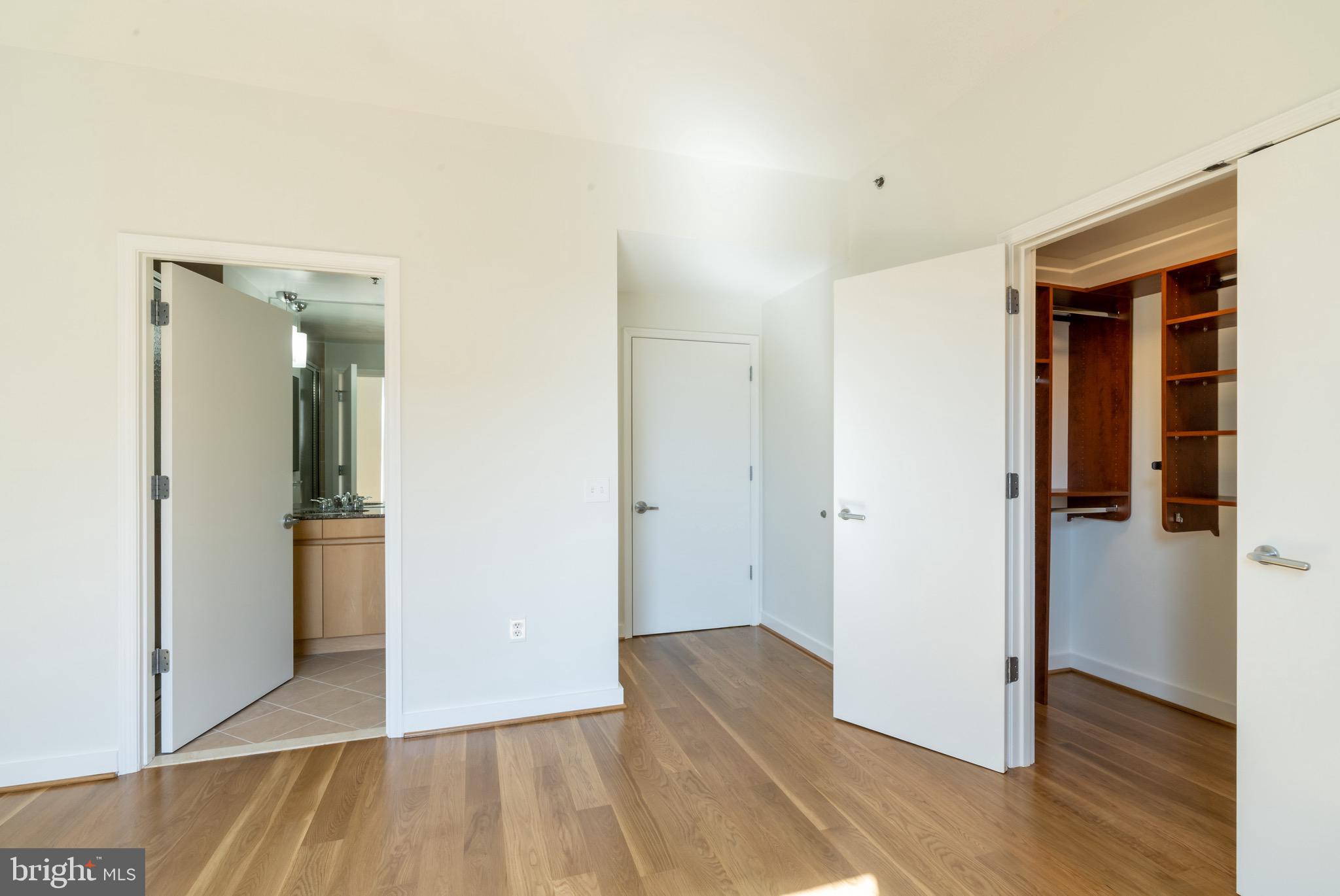 675 E Street Northwest, Unit 900 Washington, DC 20004 - Photo 35 of 46 Bedroom 2, en suite bathroom
