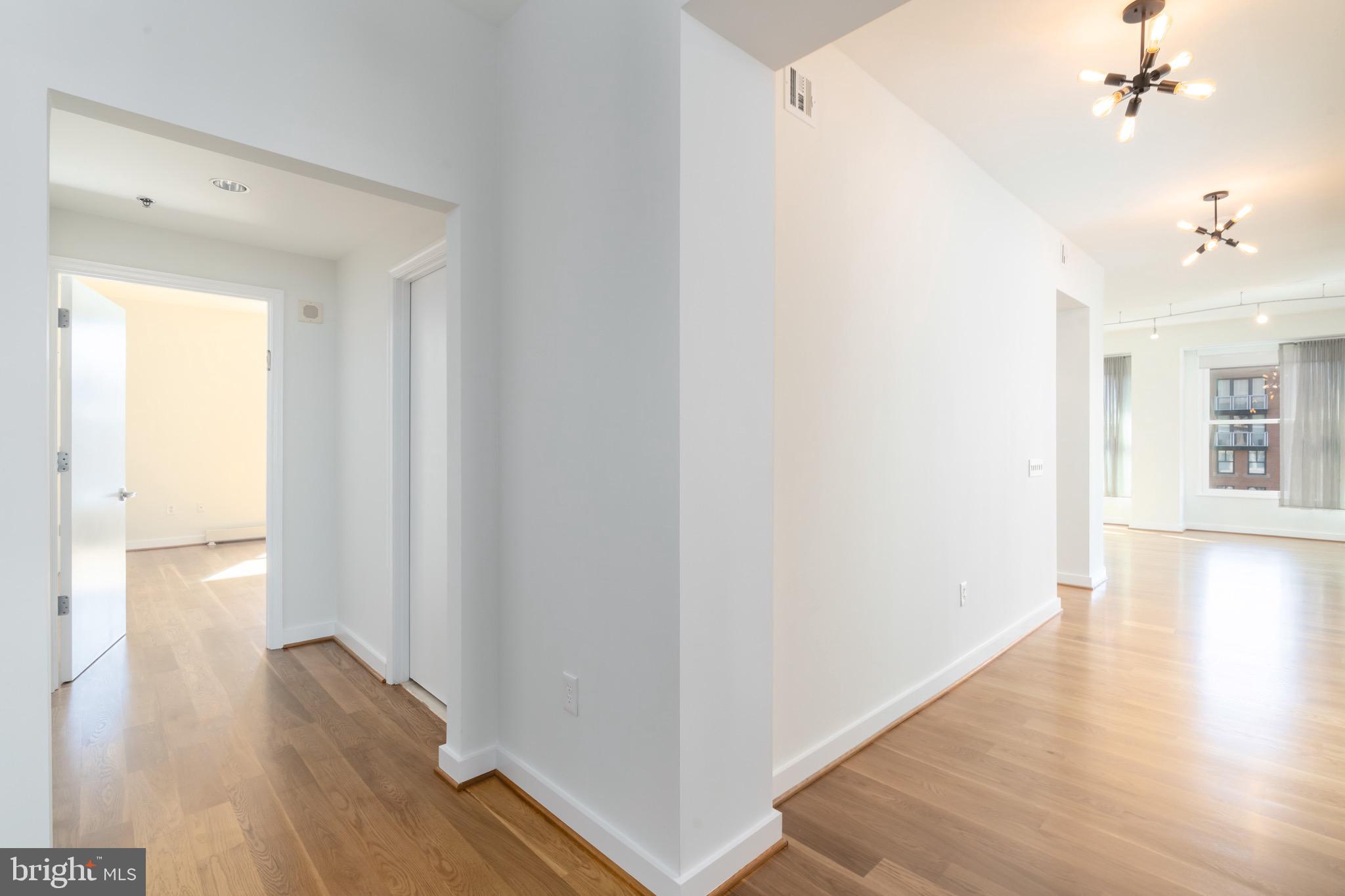 675 E Street Northwest, Unit 900 Washington, DC 20004 - Photo 3 of 46 Foyer, new flooring throughout