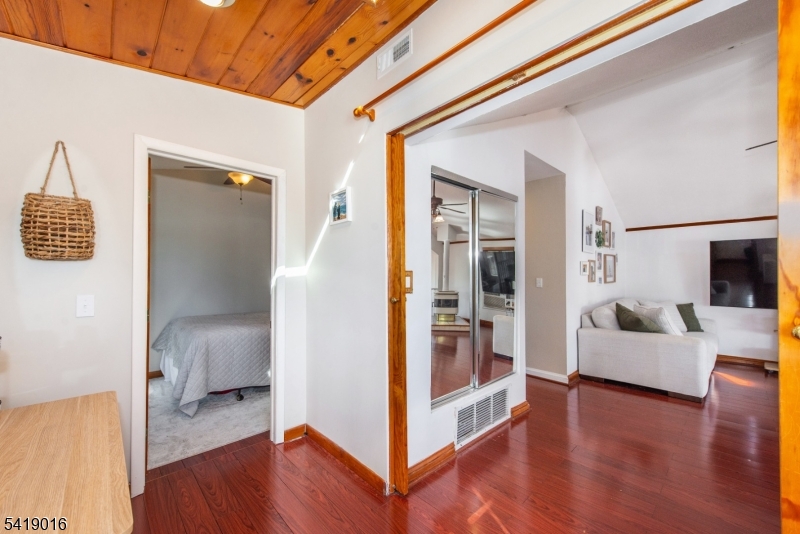 25 Lake Road Denville, NJ 07834 - Photo 11 of 45 a view of livingroom with furniture and wooden floor