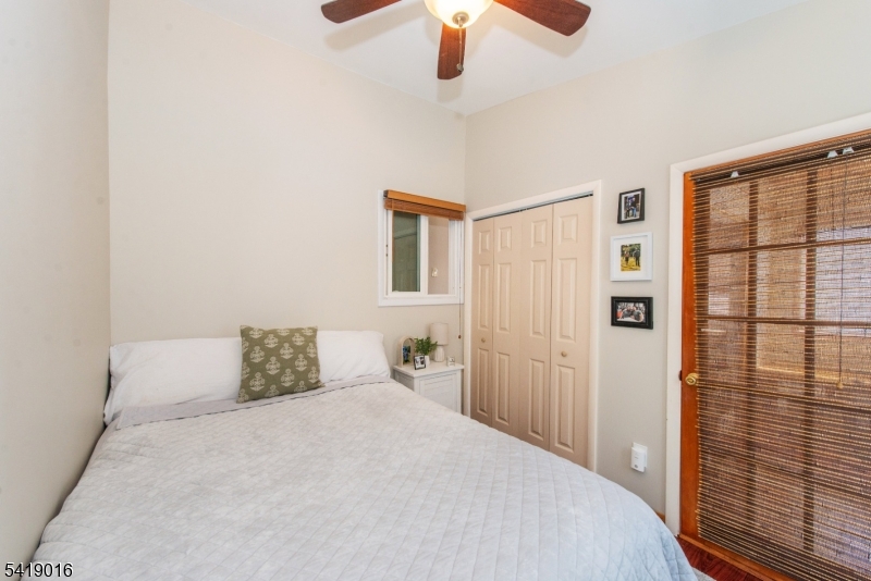 25 Lake Road Denville, NJ 07834 - Photo 14 of 45 a bedroom with a bed and a window