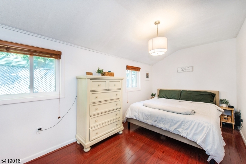 25 Lake Road Denville, NJ 07834 - Photo 19 of 45 a bedroom with a bed and a window