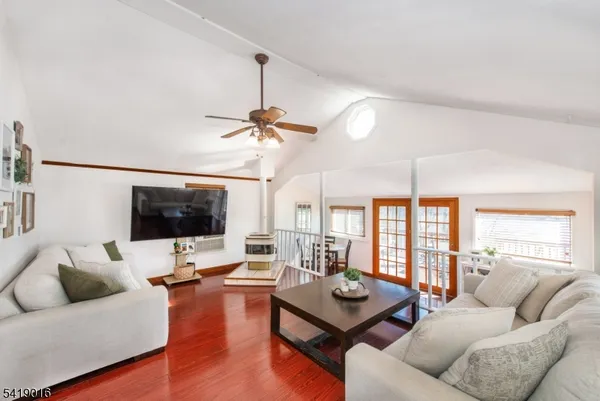 a living room with furniture or fireplace and a flat screen tv