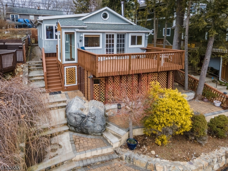 25 Lake Road Denville, NJ 07834 - Photo 34 of 45 a front view of a house with a yard