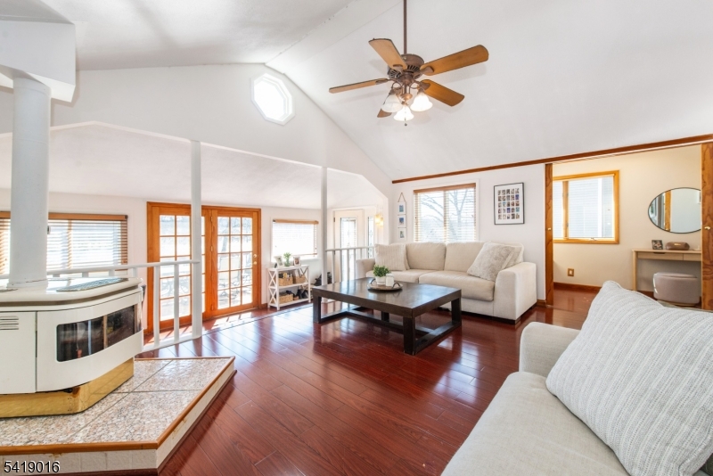 25 Lake Road Denville, NJ 07834 - Photo 4 of 45 a living room with furniture or fireplace and a flat screen tv