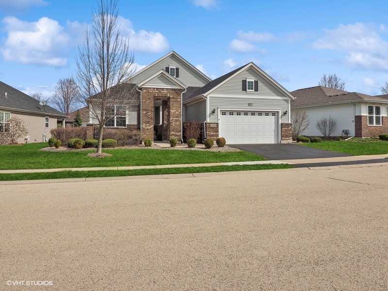 2940 Chevy Chase Lane Naperville, IL 60564 - Photo 1 of 38 a view of big house with a big yard and large trees