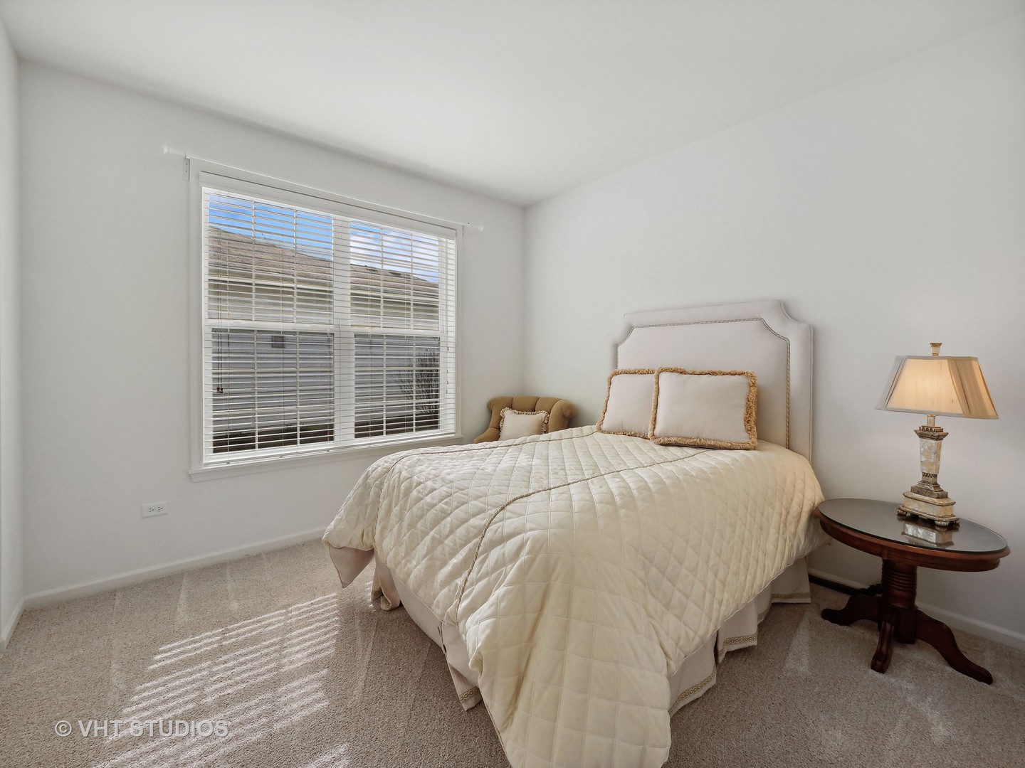 2940 Chevy Chase Lane Naperville, IL 60564 - Photo 15 of 38 a bedroom with a bed and a window