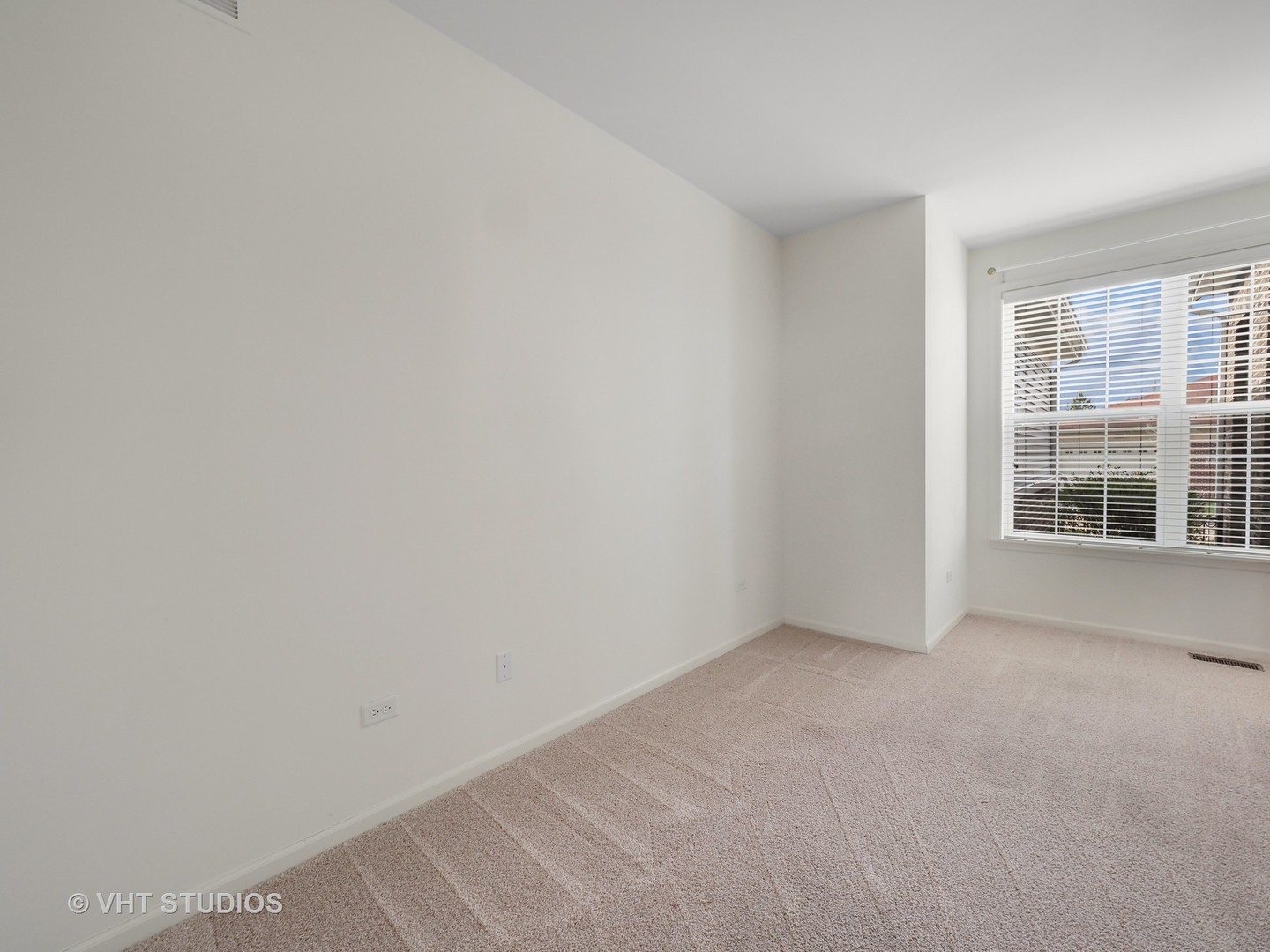 2940 Chevy Chase Lane Naperville, IL 60564 - Photo 17 of 38 an empty room with windows