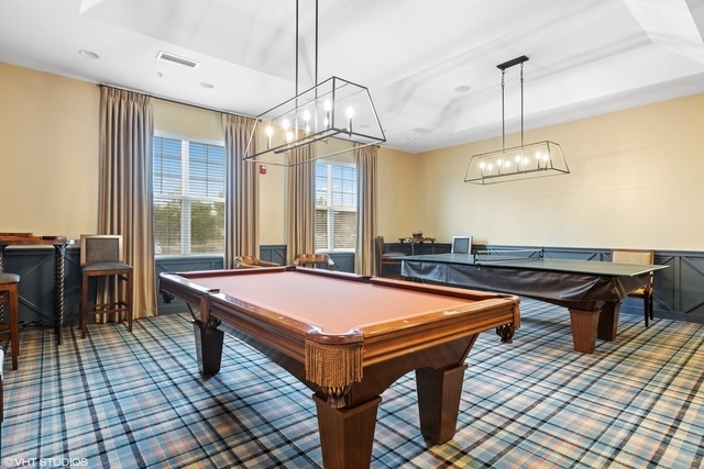 2940 Chevy Chase Lane Naperville, IL 60564 - Photo 30 of 38 a room with pool table and windows