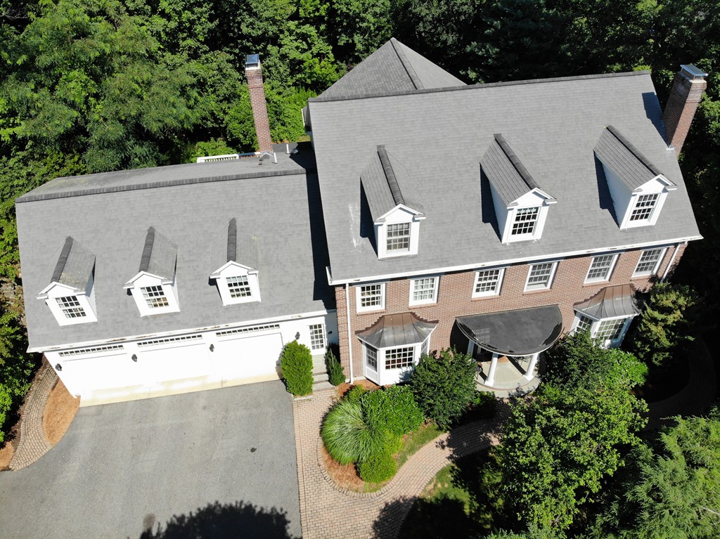 45 Arnold Road Wellesley, MA 02481 - Photo 4 of 15 an aerial view of a house with a yard and a large tree