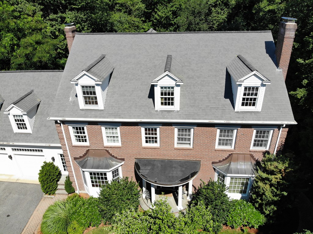 45 Arnold Road Wellesley, MA 02481 - Photo 9 of 15 a aerial view of a house with garden and plants
