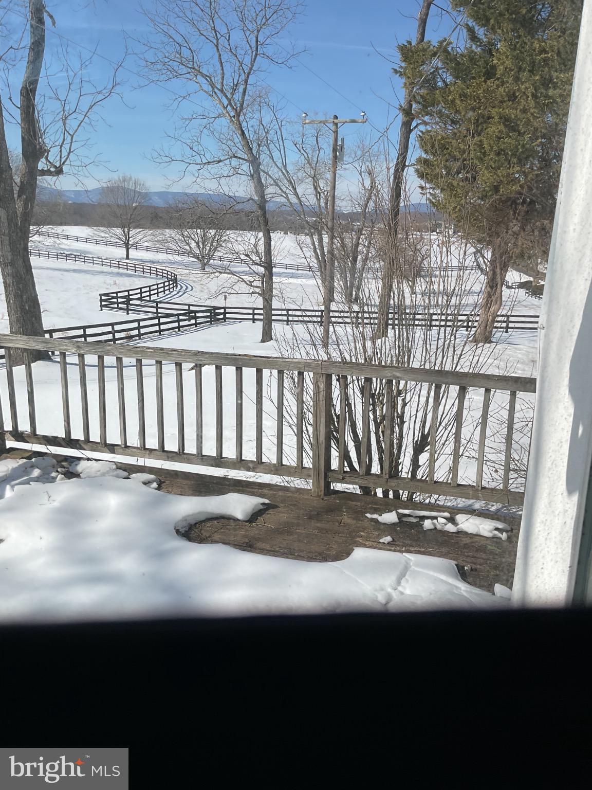 6774 Leeds Manor Road Marshall, VA 20115 - Photo 5 of 17 Winter's serene landscape unfolds beyond.