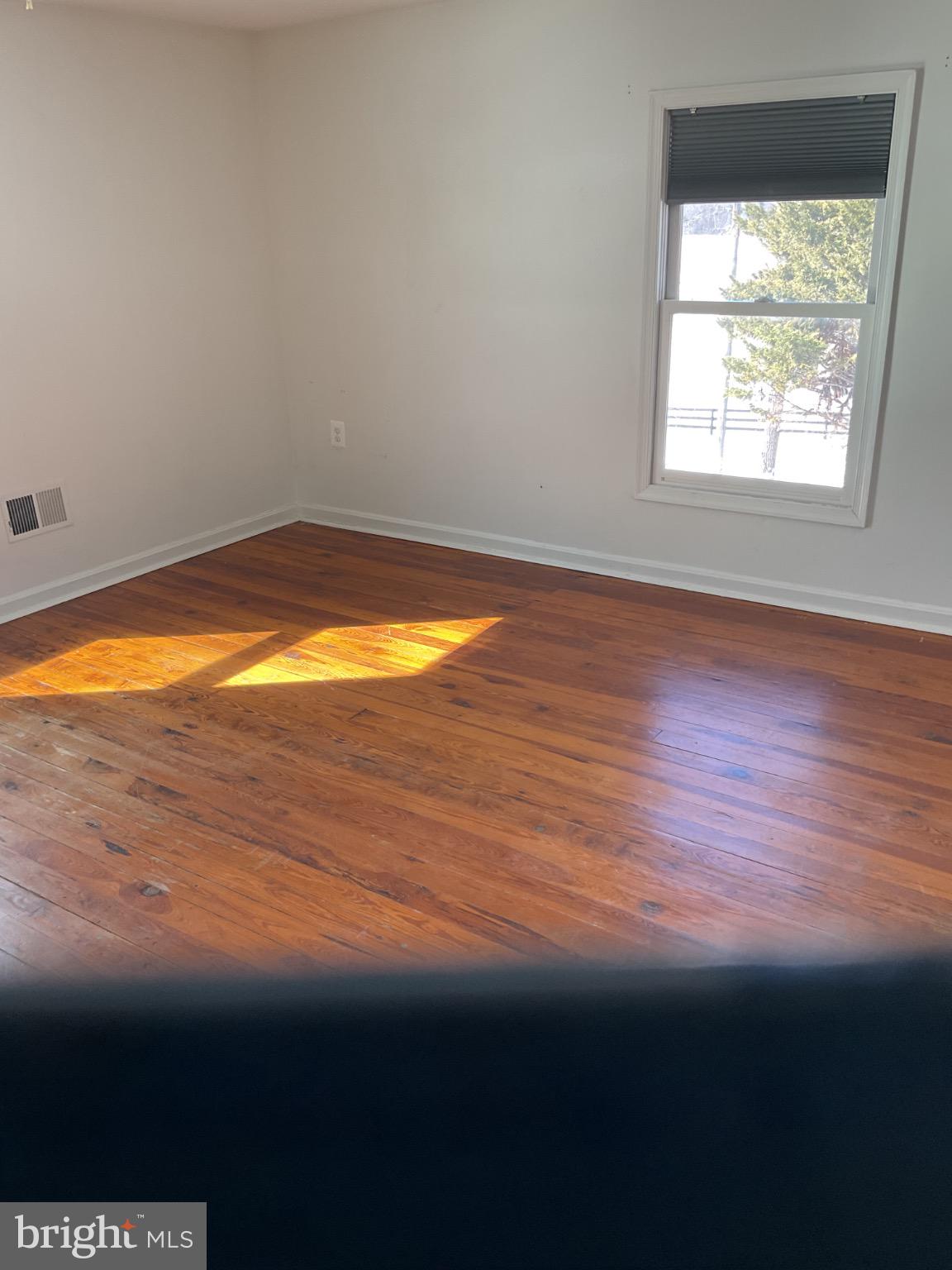 6774 Leeds Manor Road Marshall, VA 20115 - Photo 6 of 17 Sunlit room with warm wooden floors.