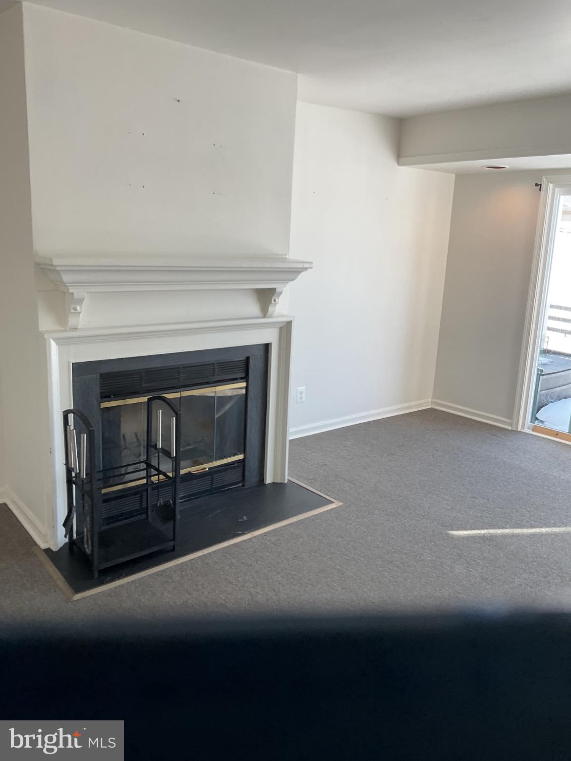 6774 Leeds Manor Road Marshall, VA 20115 - Photo 7 of 17 Bright, airy space with a cozy fireplace.