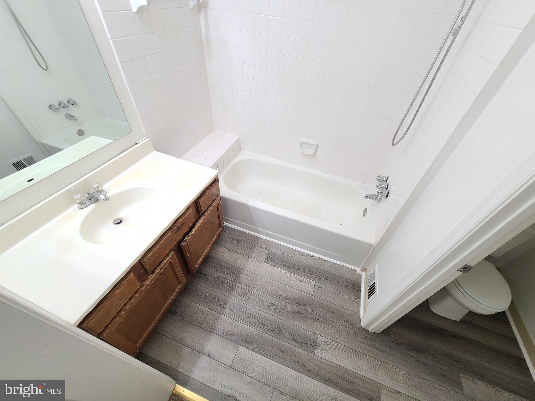 1427 Casino Circle Silver Spring, MD 20906 - Photo 24 of 34 a bathroom with a sink and a bathtub