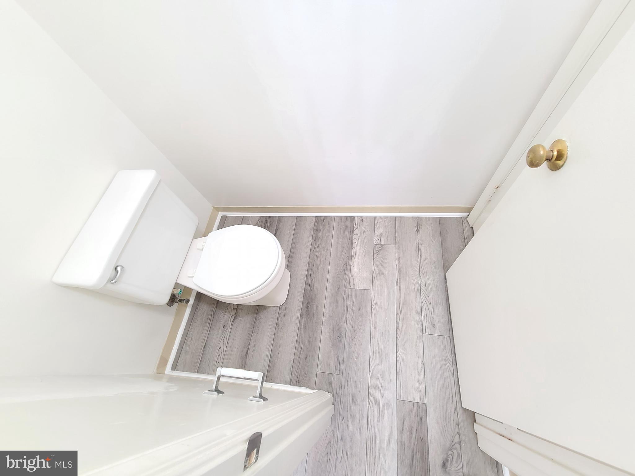 1427 Casino Circle Silver Spring, MD 20906 - Photo 25 of 34 a bathroom with a sink and a mirror