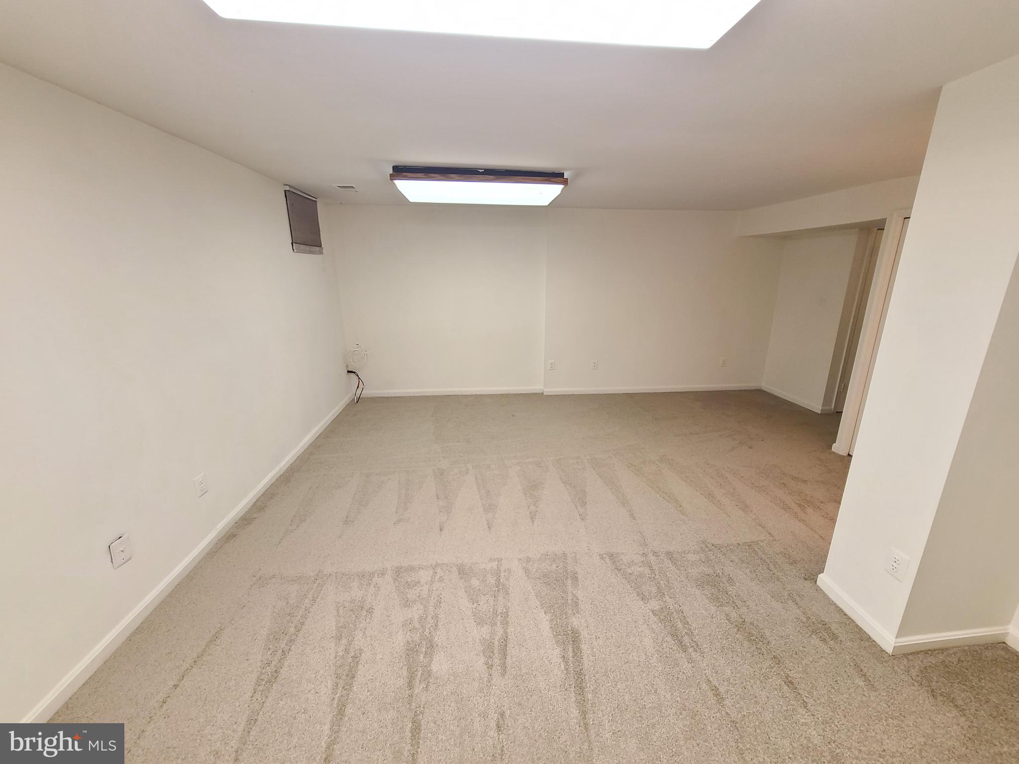 1427 Casino Circle Silver Spring, MD 20906 - Photo 29 of 34 a view of an empty room with a window