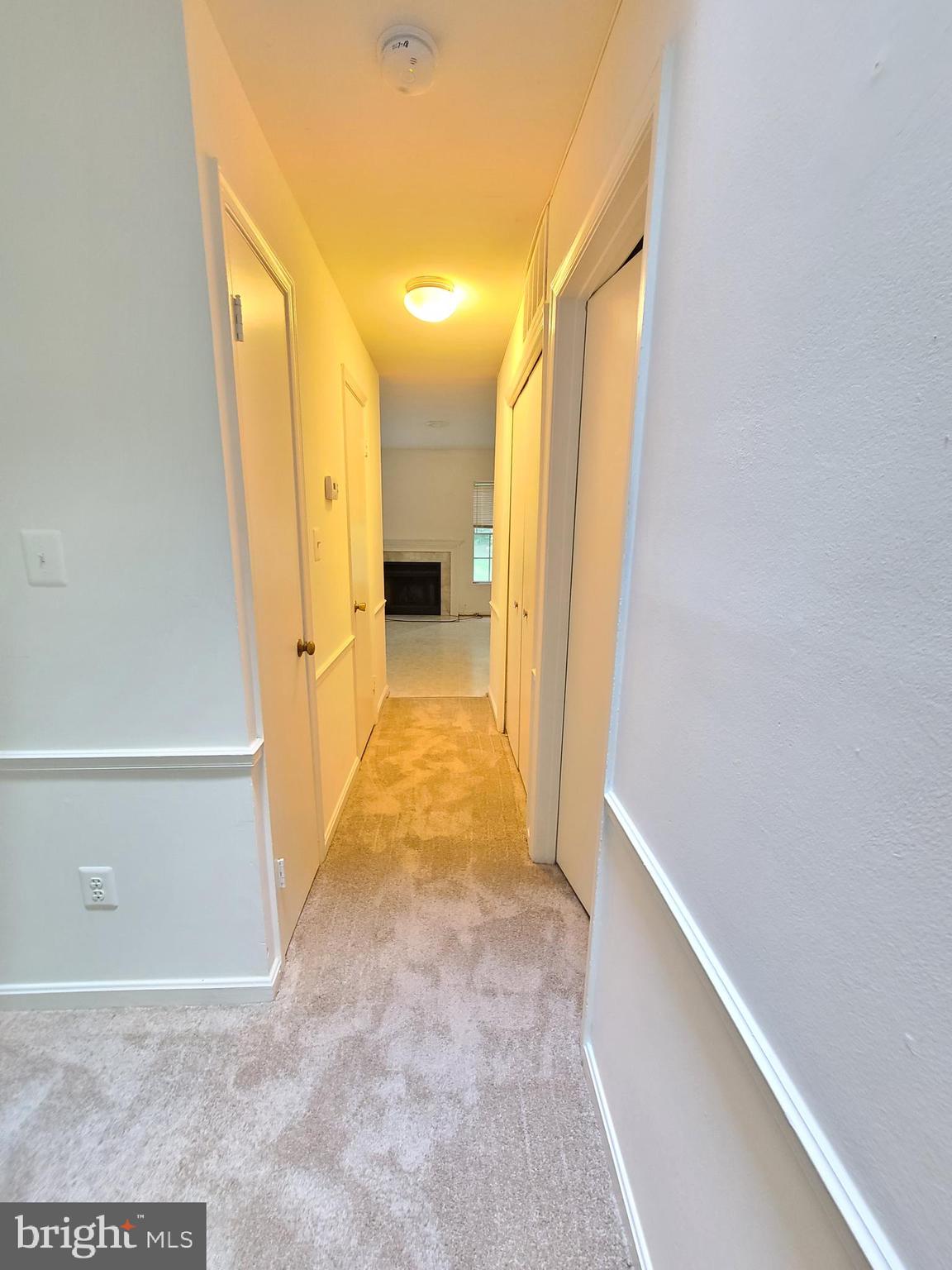 1427 Casino Circle Silver Spring, MD 20906 - Photo 34 of 34 a view of a hallway with wooden floor and a bathroom