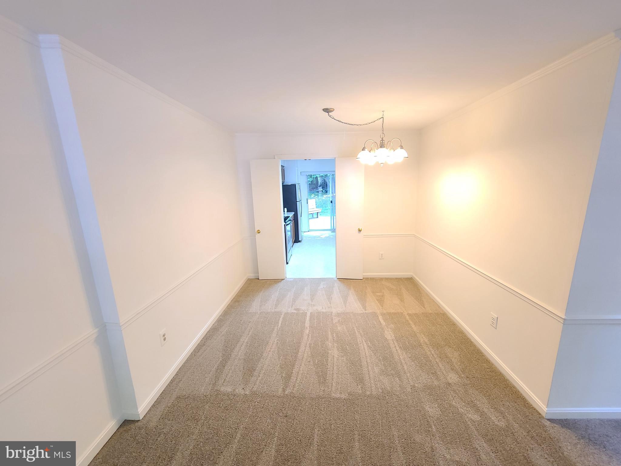 1427 Casino Circle Silver Spring, MD 20906 - Photo 4 of 34 a view of empty room with wooden floor