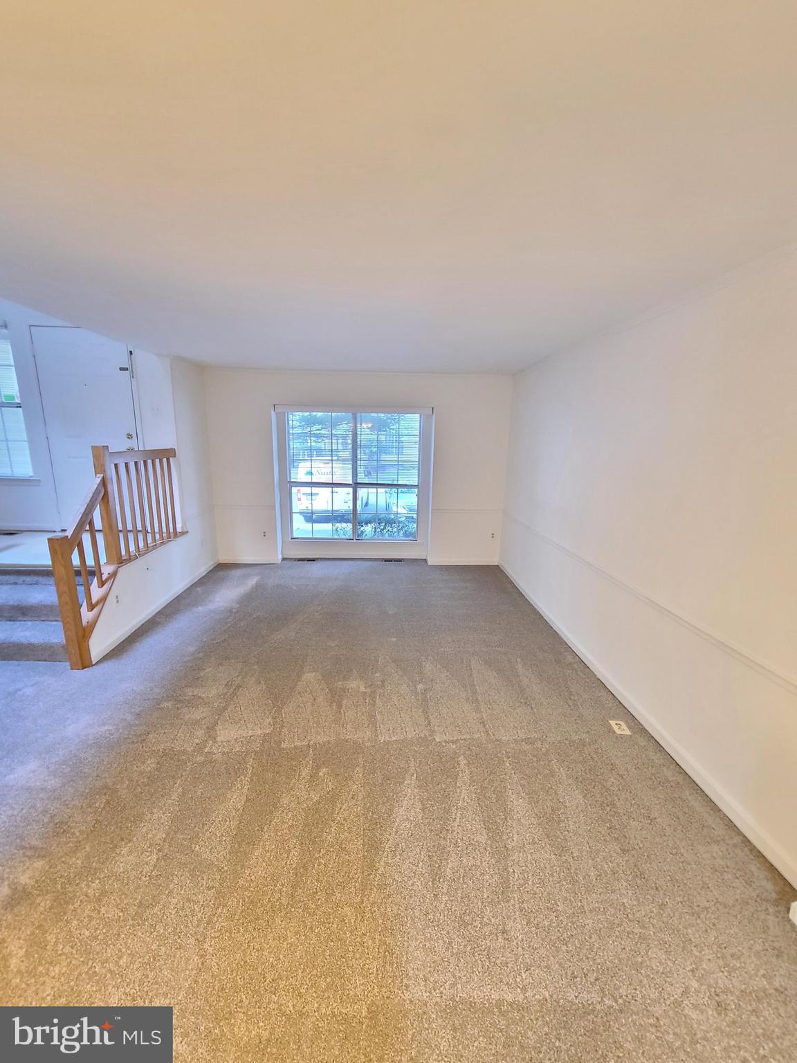 1427 Casino Circle Silver Spring, MD 20906 - Photo 5 of 34 a view of an empty room with a window